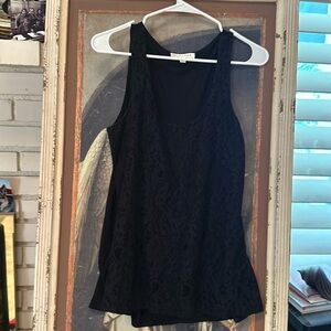 Me at tank top in size large